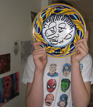 jeremy collins playing around with a plate at home